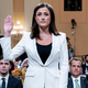Cassidy Hutchinson, former aide to Trump White House chief of staff Mark Meadows, is sworn in to testify at a hearing held on Thursday by the House select committee investigating the January 6 attack on the Capitol.